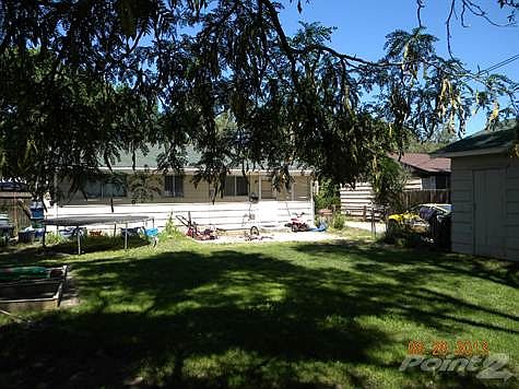 BACK OF HOME AND GARAGE