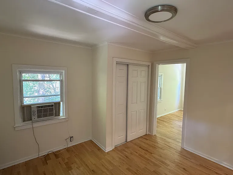Upstairs back bedroom with door to small room for office/infant or small child's room.