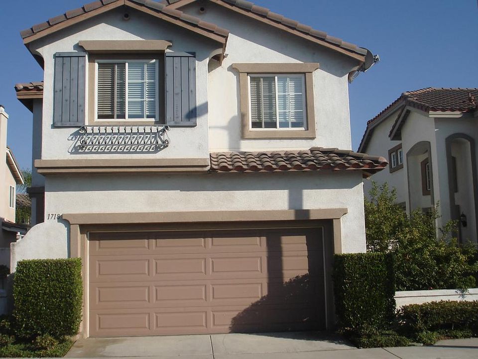 FRONT OF HOME, ATTACHED GARAGE