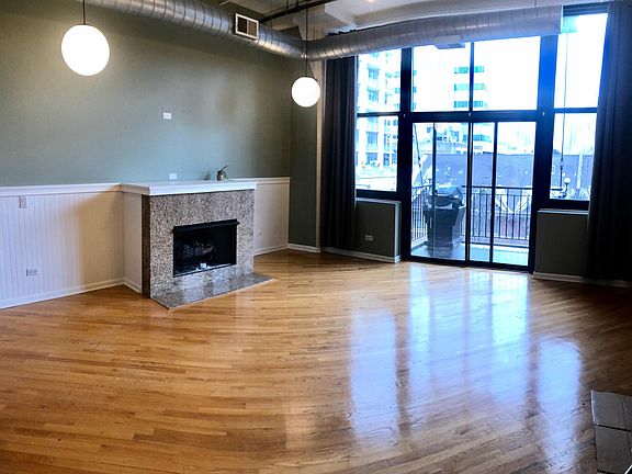 Living room. New light fixtures and ceiling fan in living room