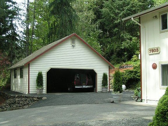 2 car garage with workbench & walk-up storage