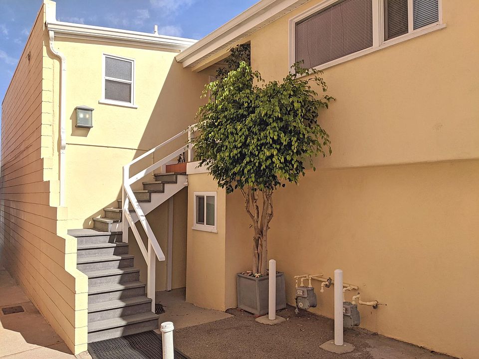 Stairs to the shared apartment patio.
