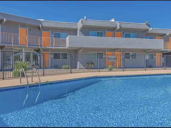 Pool and poolside area at Ocotillo Apartments.