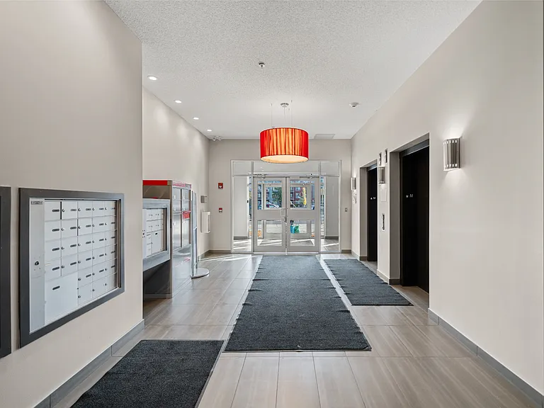 104 Mackenzie Way SW — Photo 29