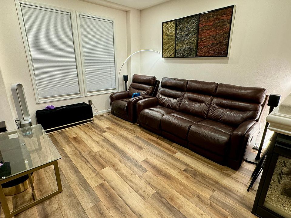 Updated living with luxury vinyl planks and upgraded levolor blinds and smart switches