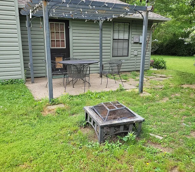 Back door with patio area