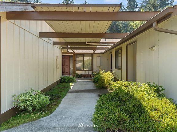 View of courtyard from your garage. Condo is and end unit in a triplex and seller reports neighbors are very nice :)