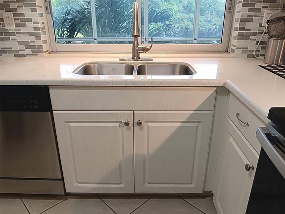 5th image of 9070 Lime Bay Boulevard #208