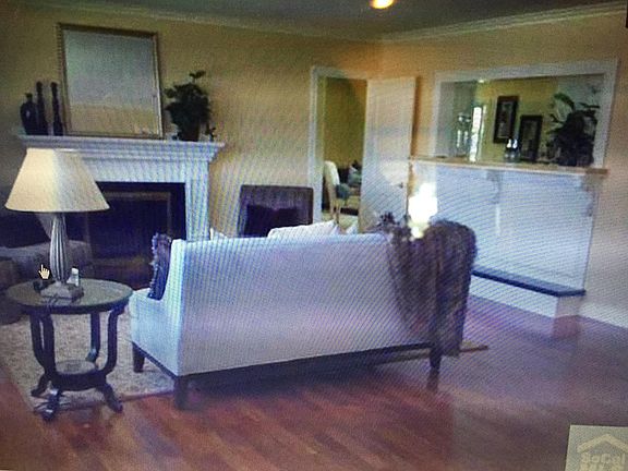 Formal living room with cozy fireplace