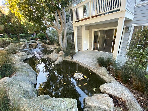 View of patio (on ground floor to the right of the flowing waterscape)