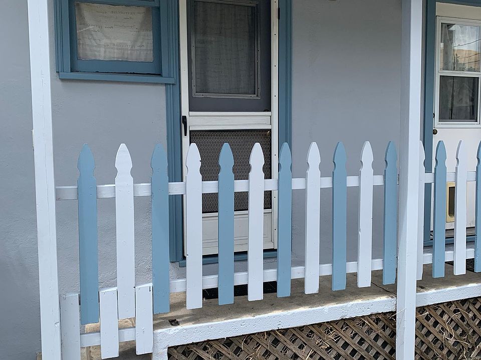 Back door, parking space in front.