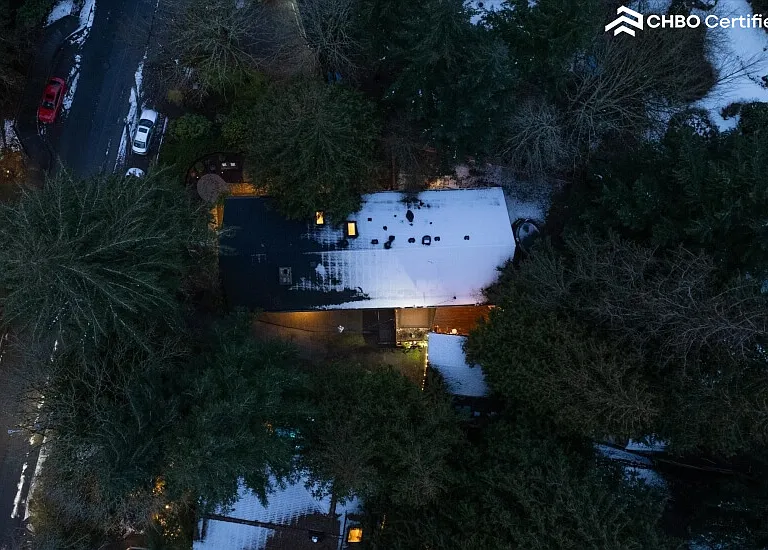 Perched on hill and nestled among trees creates privacy