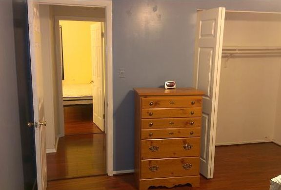 View from the master bedroom looking into an adjacent bedroom.