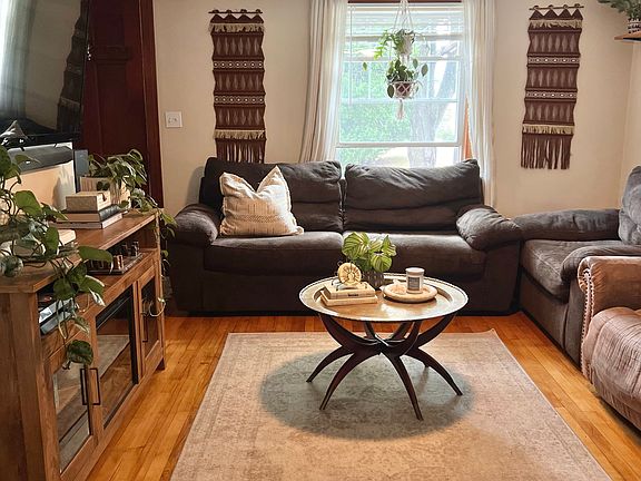 Living room, TV mount included. 
Ceiling fan swapped for a low profile fan for more head space