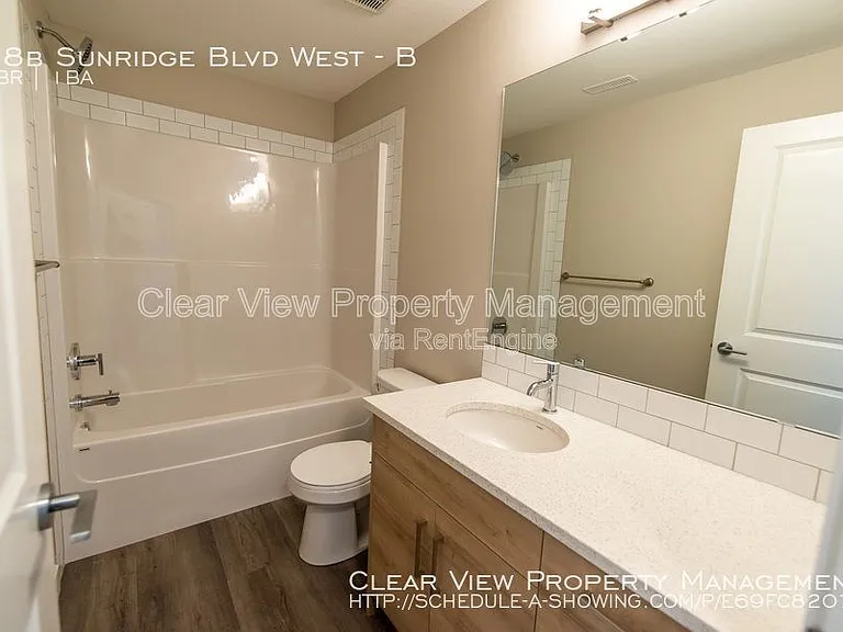 94 Sunridge Blvd W #LOWER LEVEL — Photo 12