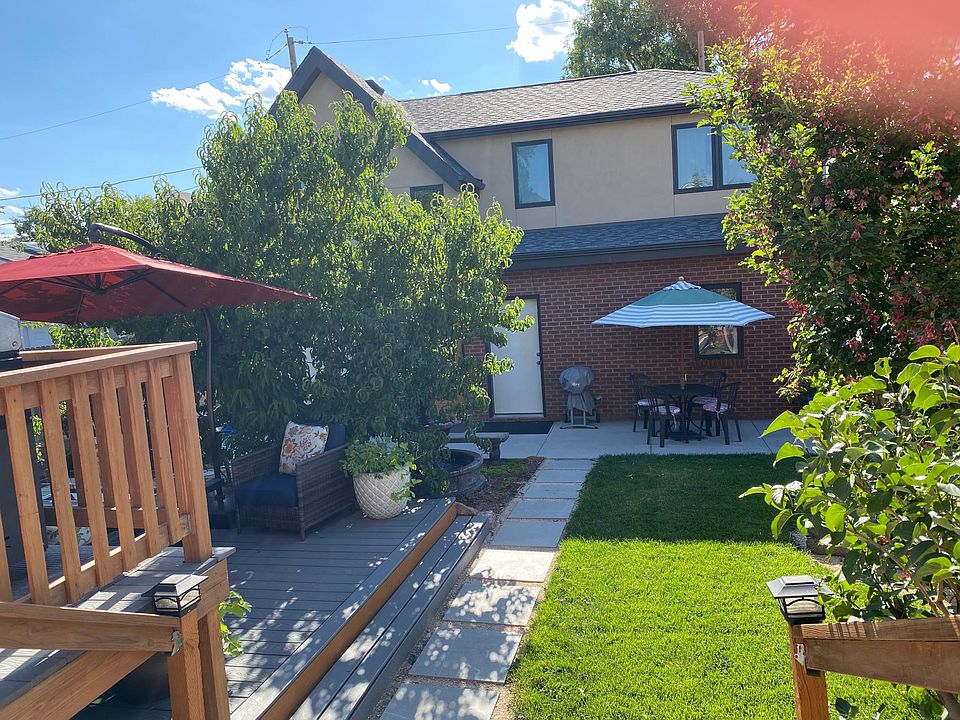 Shared backyard. (View of apartment from house.)