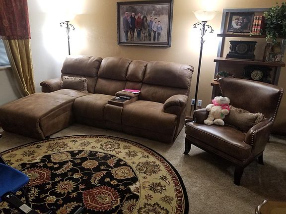 Super comfortable double reclining sofa- chair goes