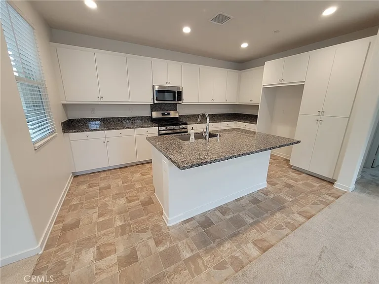 7450 Desert Holly St — Photo 3