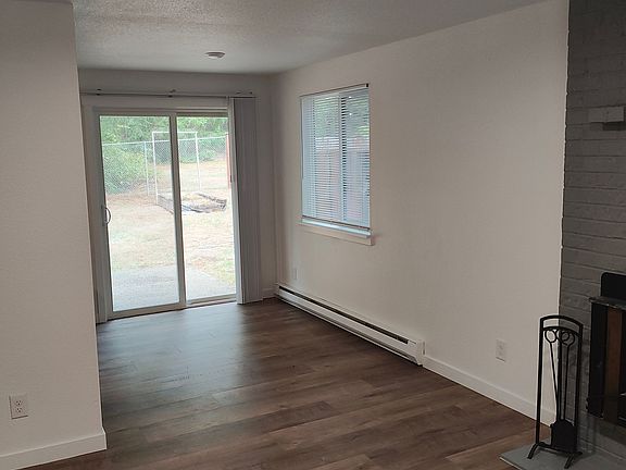 sliding door to fenced in backyard patio