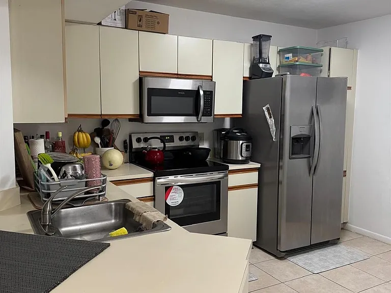 8955 Wiles Rd #206 — Photo 7