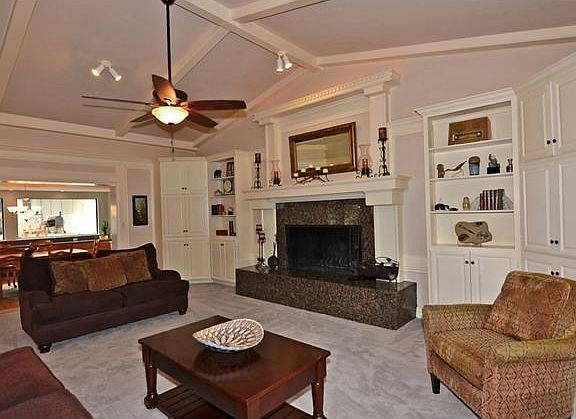 A very quick overview of the home starts with a gorgeous living room with an over-sized and romantic