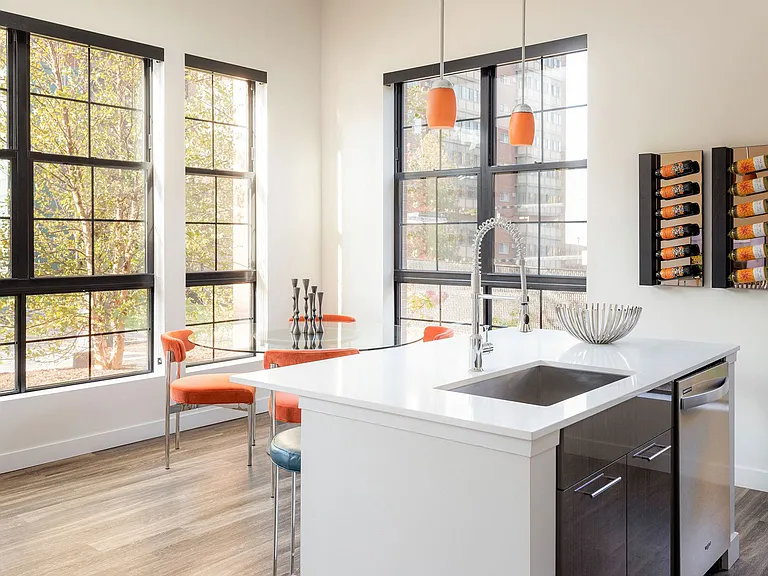 Wide plank flooring gives your apartment home a modern look