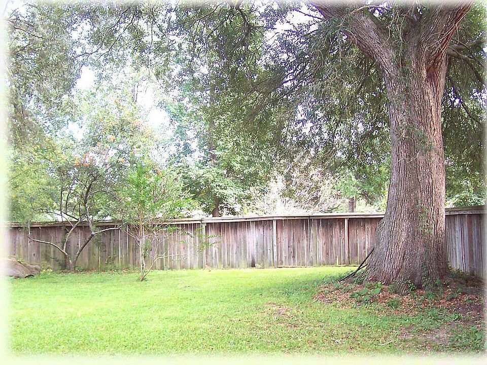 It's summertime, and the living is easy in this wonderful backyard.