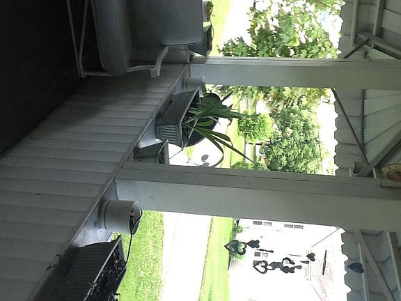 Covered front porch that has awnings that keep the rain out 