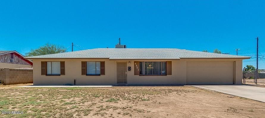 Front with 2 Car Garage