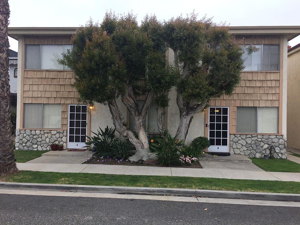 235 8th Street. Apt A = left 1/2; Apt B = right 1/2. Split down the middle.