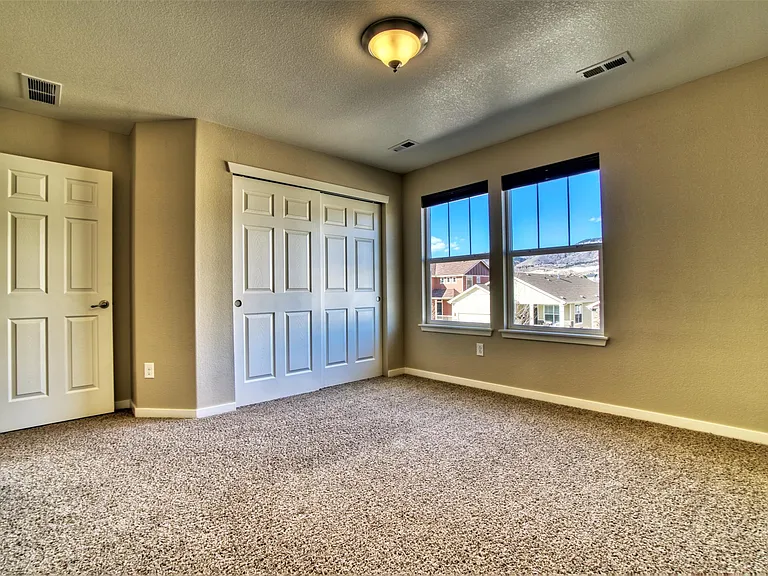 Upper level - bedroom 3 (15' x 12').