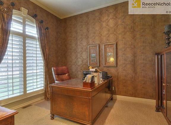 Sophisticated den with designer finishes and natural light.