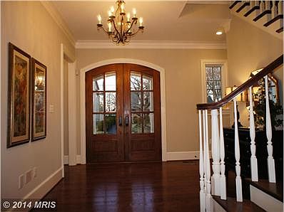 Foyer with double mahogany doors