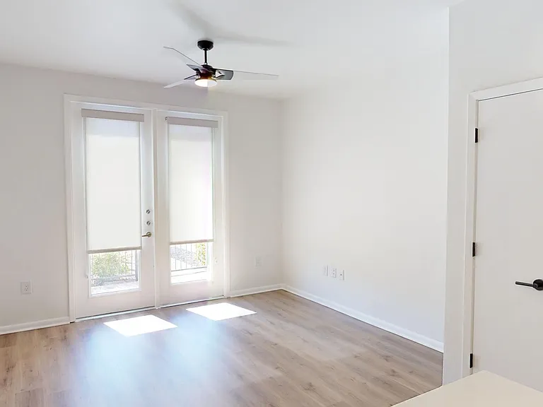Apartment Living Room with Wood Style Flooring and Patio/Balcony.