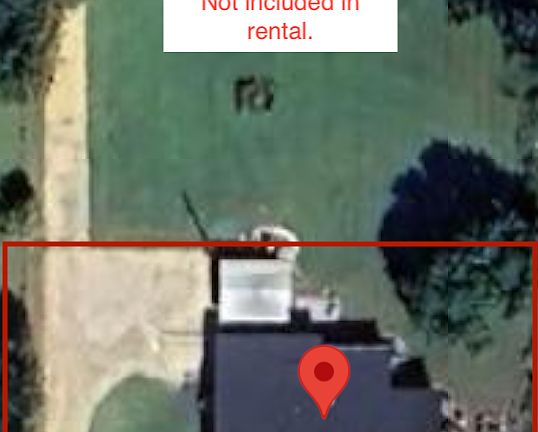 Aerial view of rental and barns in the back that are not part of the rental property.