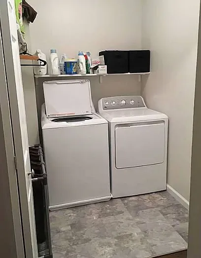 main level washer and dryer as well as built in hanging rack and space for storage