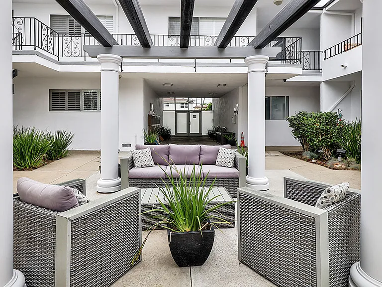 Shaded courtyard gazebo for relaxing or reading.