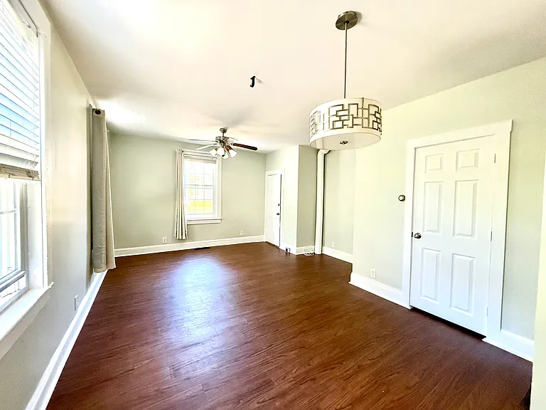 Living Room with extra large coat/storage closet plus area for dining table