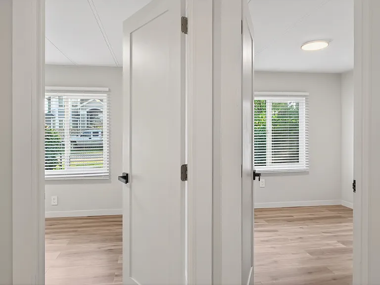 Hallway View with Both Bedroom Doors
