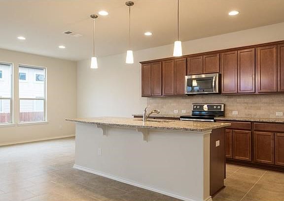 Photo of a Pulte Home with Same Floor Plan, Not of Actual Home Listed
