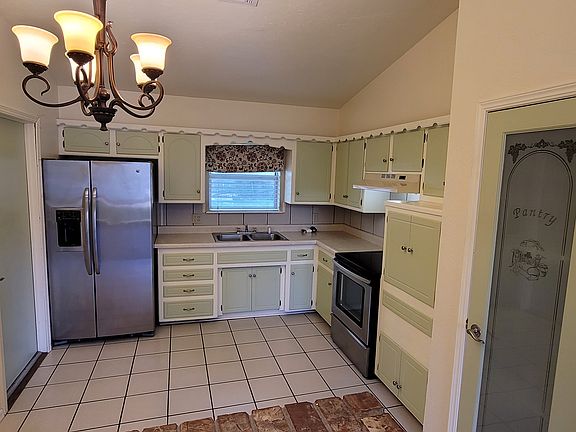 Kitchen with a large pantry and tons of storage!