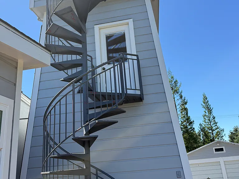 tower stairs to 2nd floor yoga/meditation retreat and upper viewing deck