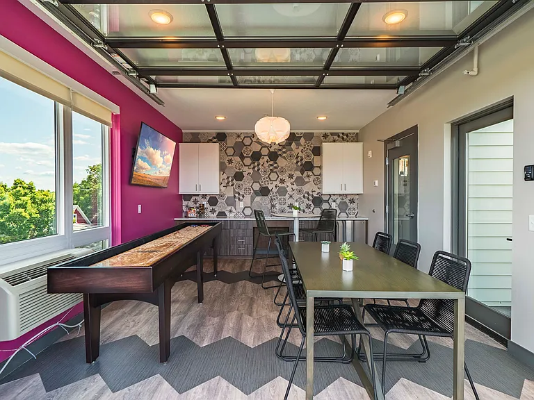 Our rooftop community room is great for gathering with friends to a meal or game night.