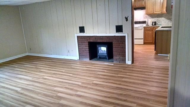 Living room with opening to kitchen 