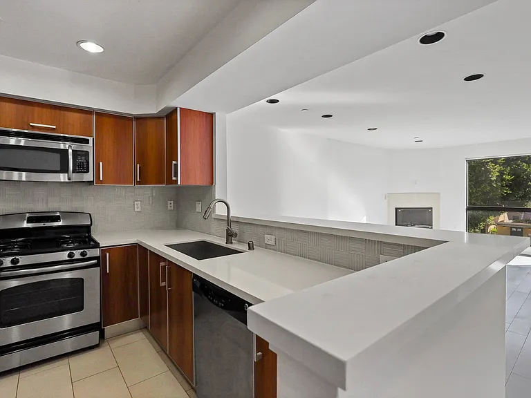 Open-Concept Kitchen, Dining, and Living Room Space