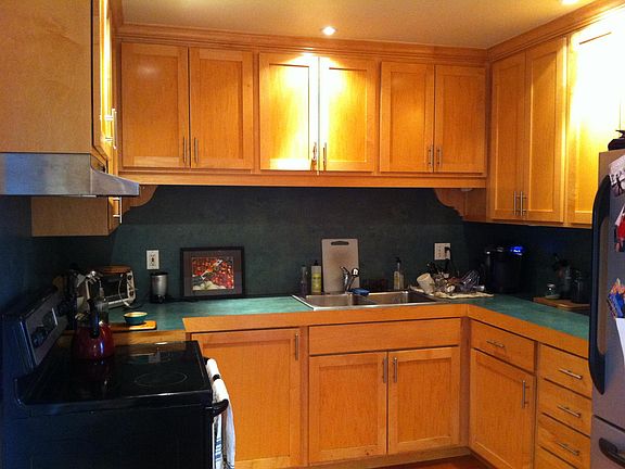 Large new kitchen with stainless steel matching appliances