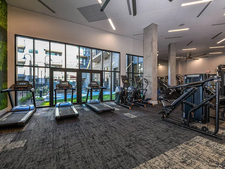 Our fitness center is complete with free weights and cardio machines.