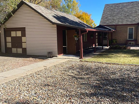 Rear entrance to garage thru backyard