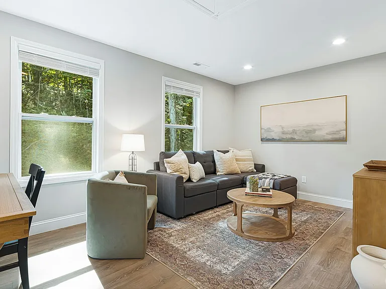 Stairs lead up to open 2nd living room