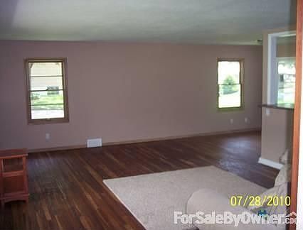 Open Spacious Living Room
						:
						Open concept layout leads to dining room and kitchen